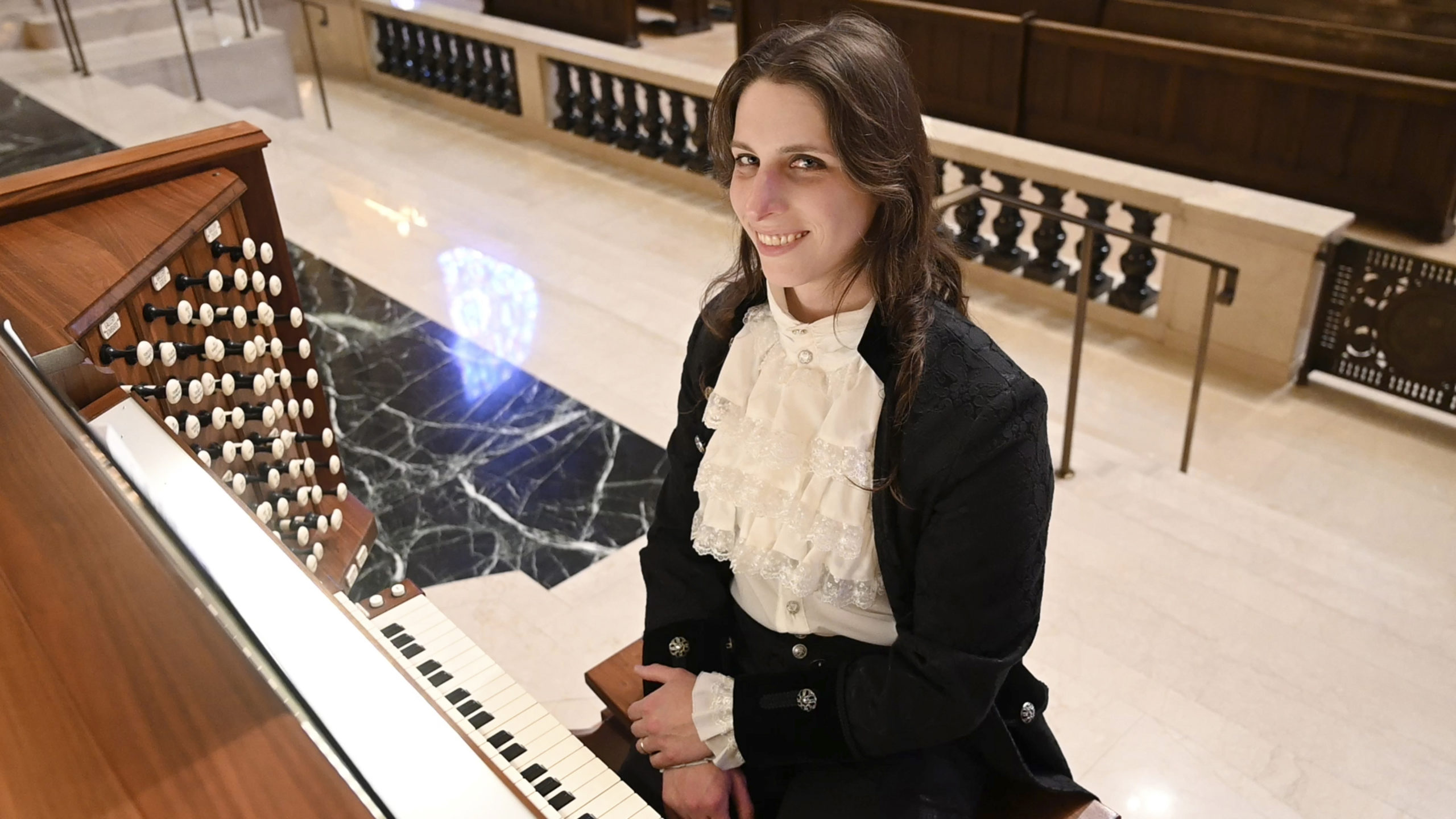 Dr. Kristina Rizzotto Dr. Kris Rizzotto at the organ transgender organist composer pianist